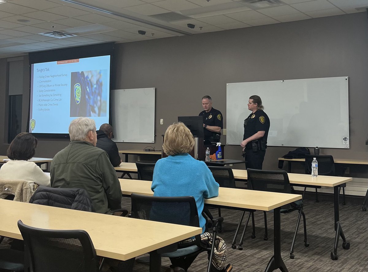 Chief Milburn and Officer Donahue getting ready to address the Rolling Green neighborhood for an evening of public safety and law enforcement planning.