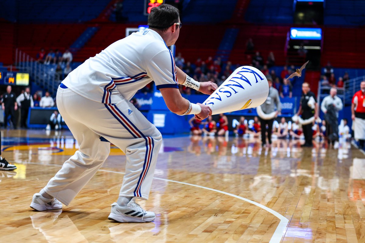 Here's a GREAT SHOT of the effort one member of the KU spirit squad went to to try to snag the bat that crashed tonight's KU women's game. Crazy! #KUbball 

Photos by <a href="/TheChanceParker/">Chance Parker</a>