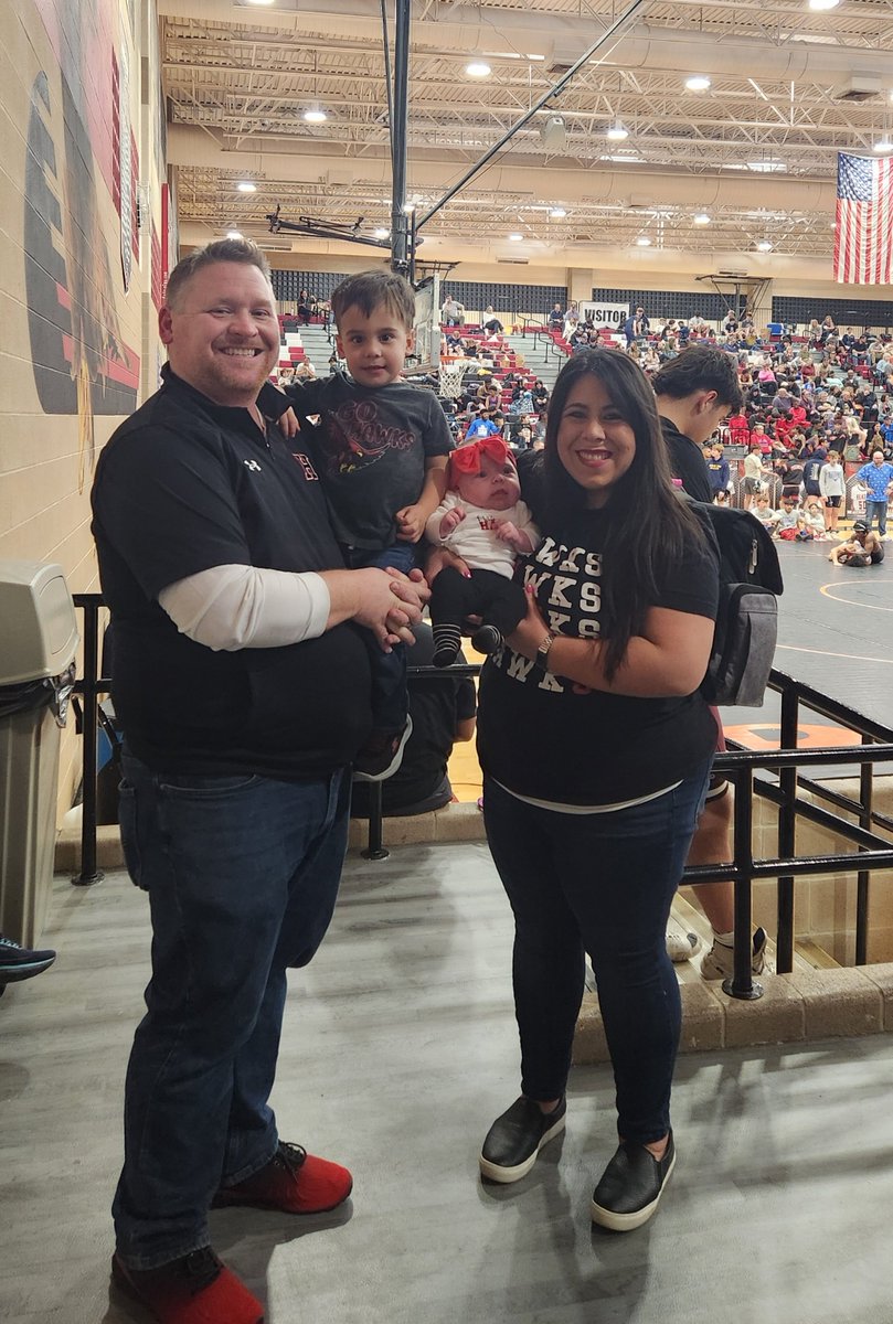 MrsCourtneyWHS's tweet photo. We made it out to cheer on the Heath wrestlers at Districts yesterday. Aiden had a blast and Kylie slept through most of it haha... but she looked cute in her Heath gear!! Go Hawks!! @CoachRCourtney @RHHSHawks @HeathWrestling https://t.co/TfF5qrQoxt