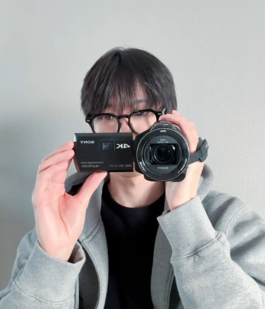 Doyoung was filming with the video camera and gave a spoiler that he's filming something that could be like a vlog these days, but he stopped himself from spoiling more