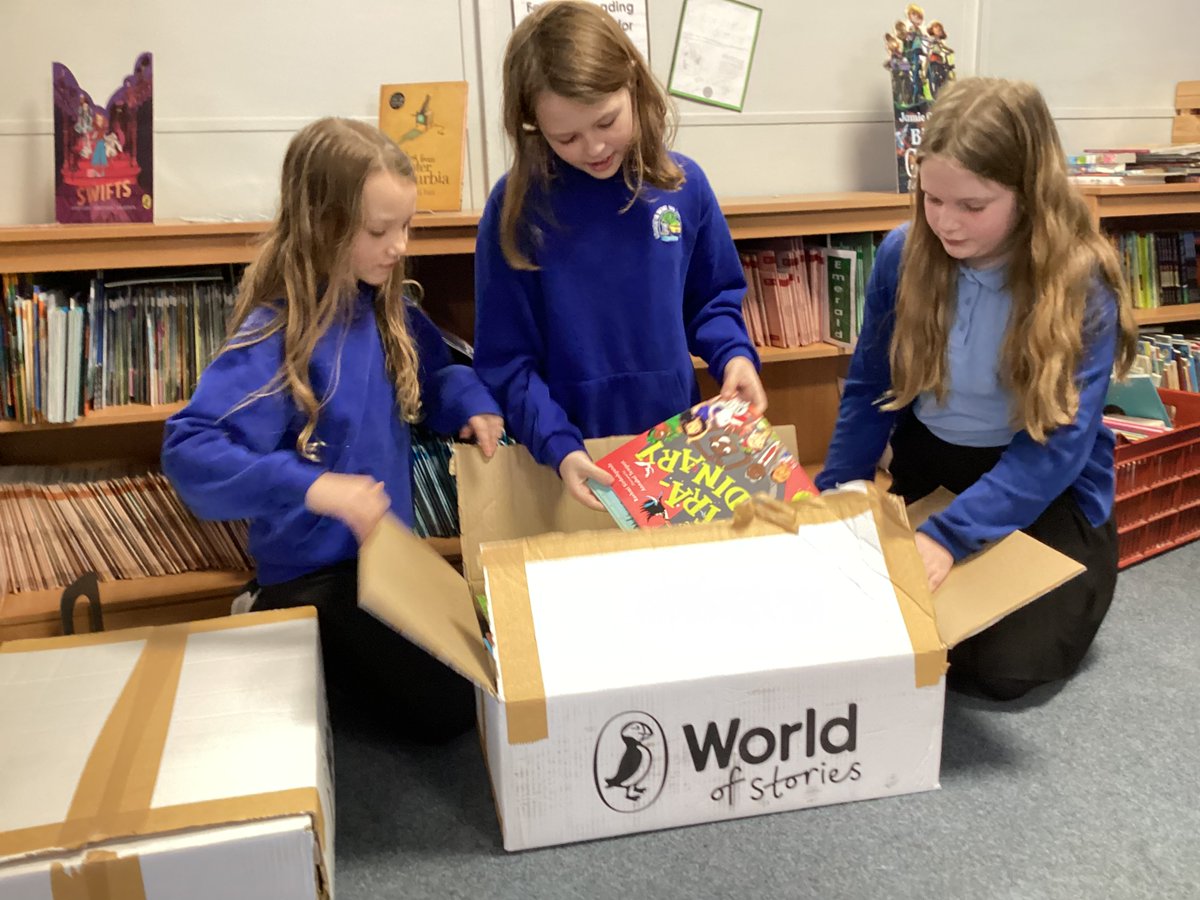 wroughtonjun's tweet photo. Unboxing our fantastic delivery from #worldofstories An amazing 300 new books ready for our library. As you can see our children are so grateful and they are excited to start reading! @Literacy_Trust @PuffinBooks #proudtobelong https://t.co/jQmKpZsy7E