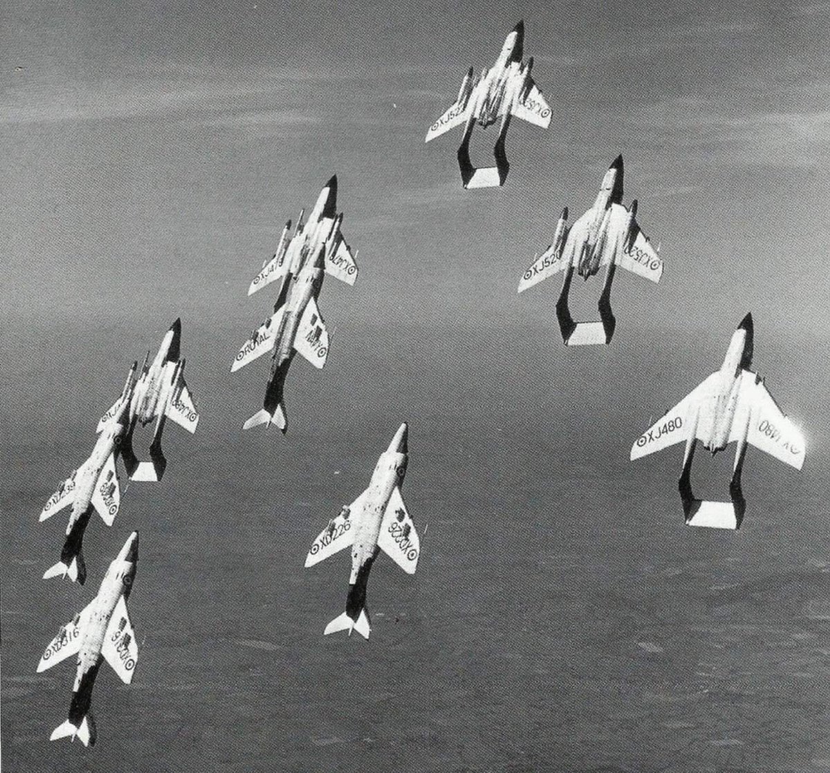 Five de Havilland Sea Vixens of the (unusually named) formation display team, 'Fred's Five' of 766 NAS. 
They are in company with four Supermarine Scimitars from 736 NAS, based at RNAS Lossiemouth. 
This great photo probably originates from the Farnborough display of 1962.