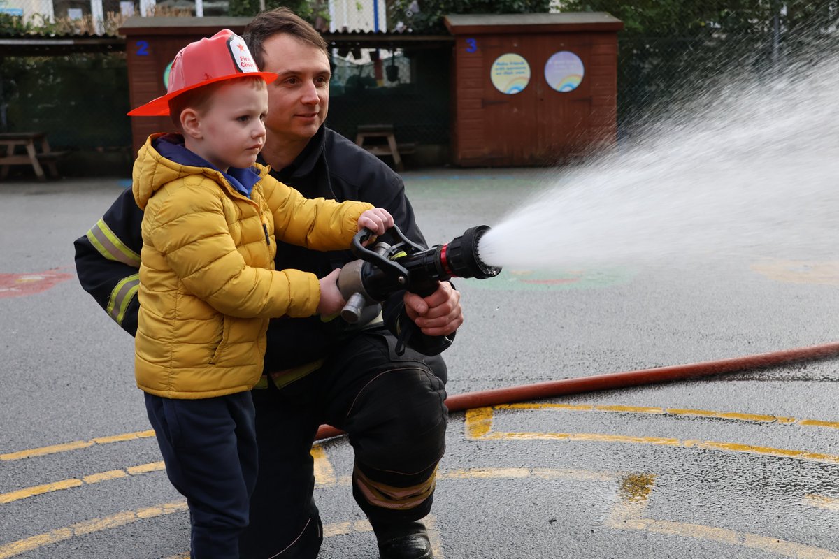 Eliz_Coll's tweet photo. What a fun morning at Pre-School! The children really enjoyed exploring the @GuernseyAirport fire engine &amp; having a go with the hose as part of their learning on people who help us in the community &amp; different professions. Thank you to Lexi’s daddy for bringing the engine!
#ECJS https://t.co/GKCMB5sy6a