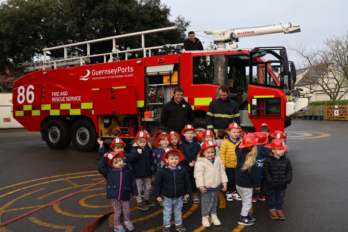 Eliz_Coll's tweet photo. What a fun morning at Pre-School! The children really enjoyed exploring the @GuernseyAirport fire engine &amp; having a go with the hose as part of their learning on people who help us in the community &amp; different professions. Thank you to Lexi’s daddy for bringing the engine!
#ECJS https://t.co/GKCMB5sy6a