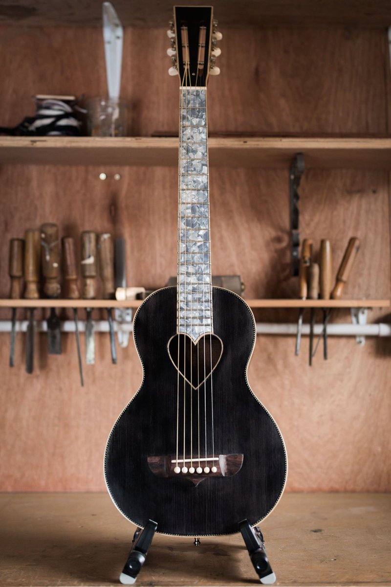 Latest finished guitar and a clean workshop.