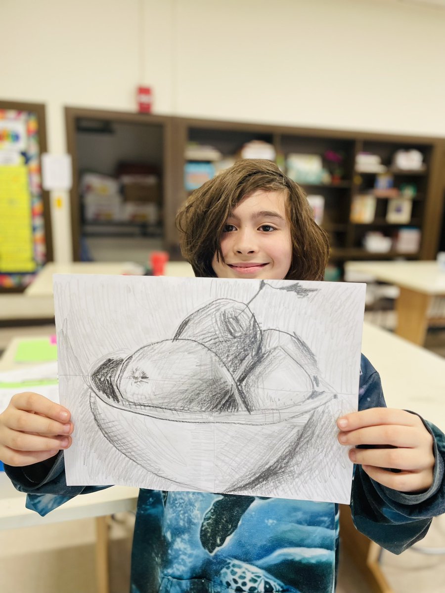 Roosevelt fifth grade artists are practicing drawing skills by using the grid method and adding value with graphite crayons…They are showing lots of persistence to try their best!