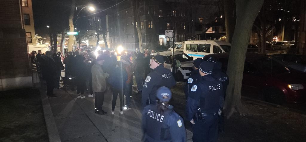 20th District Officers attending a prayer vigil held for the victims of yesterday's shooting