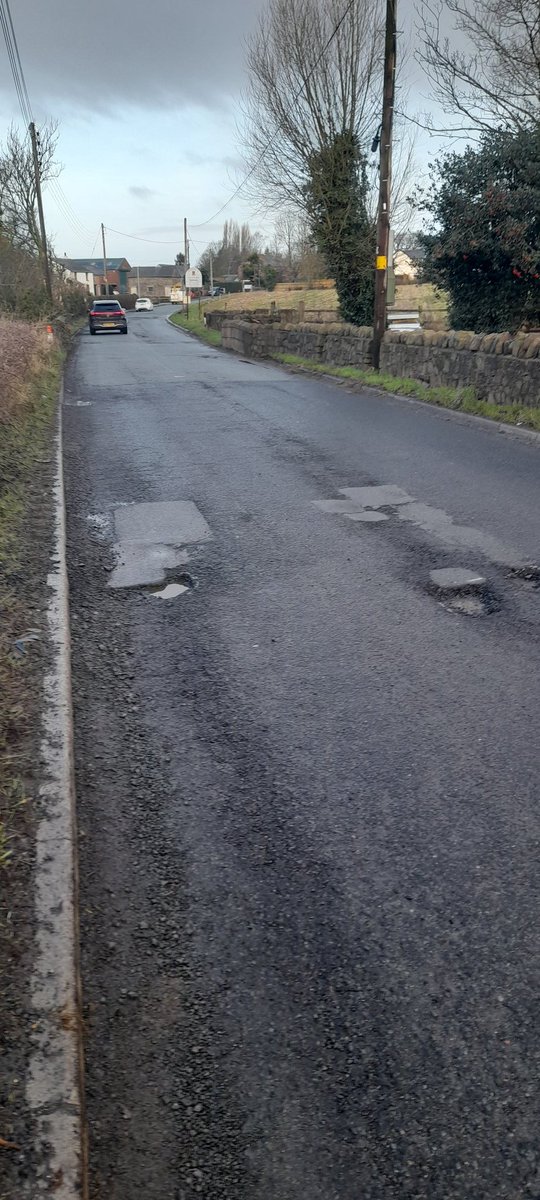 robertturnock's tweet photo. I hit a pothole today, burst my tyre and nearly crashed my car. This is the B5426 between Rufford and Bispham. There are so many potholes that the road is unsafe. When are @LancashireCC going to resurface the road properly rather than doing terrible repairs that don't last? https://t.co/tnxWBkVbge
