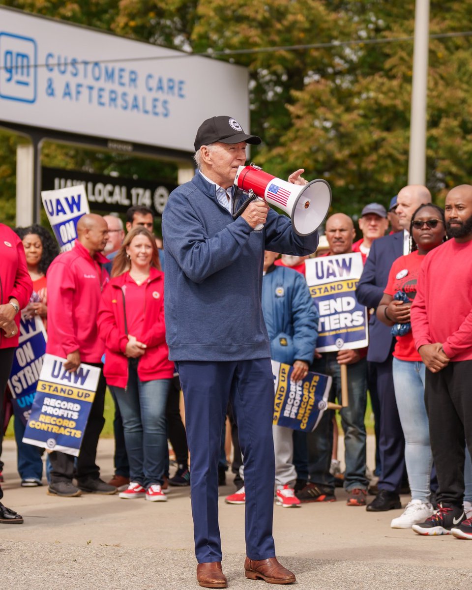 President Joe Biden addresses UAW members walking a picket line at the GM Willow Run Distribution Center, in Belleville, Michigan. 