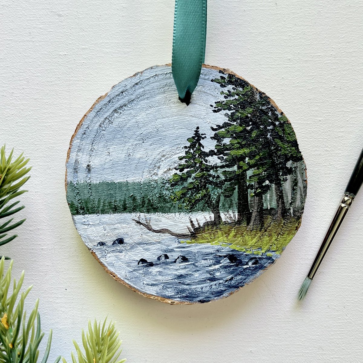 Painted this little wood slice ornament as a Christmas gift. I got to give it to my friend super late 😂 It’s from a photo I took during a road trip we took together. Lake Odell ❤️ 

About 3x3 inches with acrylic paints.