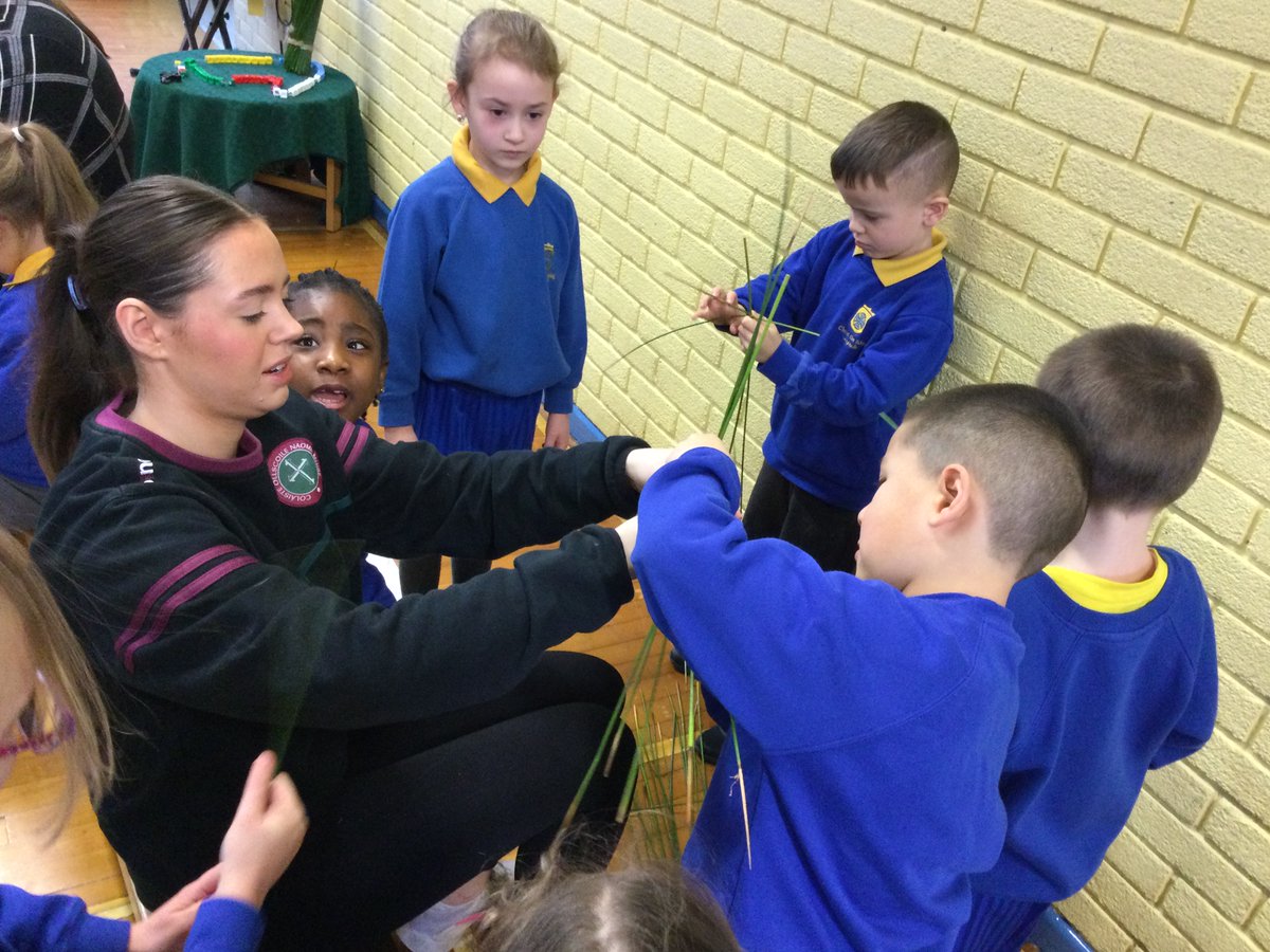 Celebrating St Brigid’s Day, Year 2 pupils making St Brigid’s crosses.