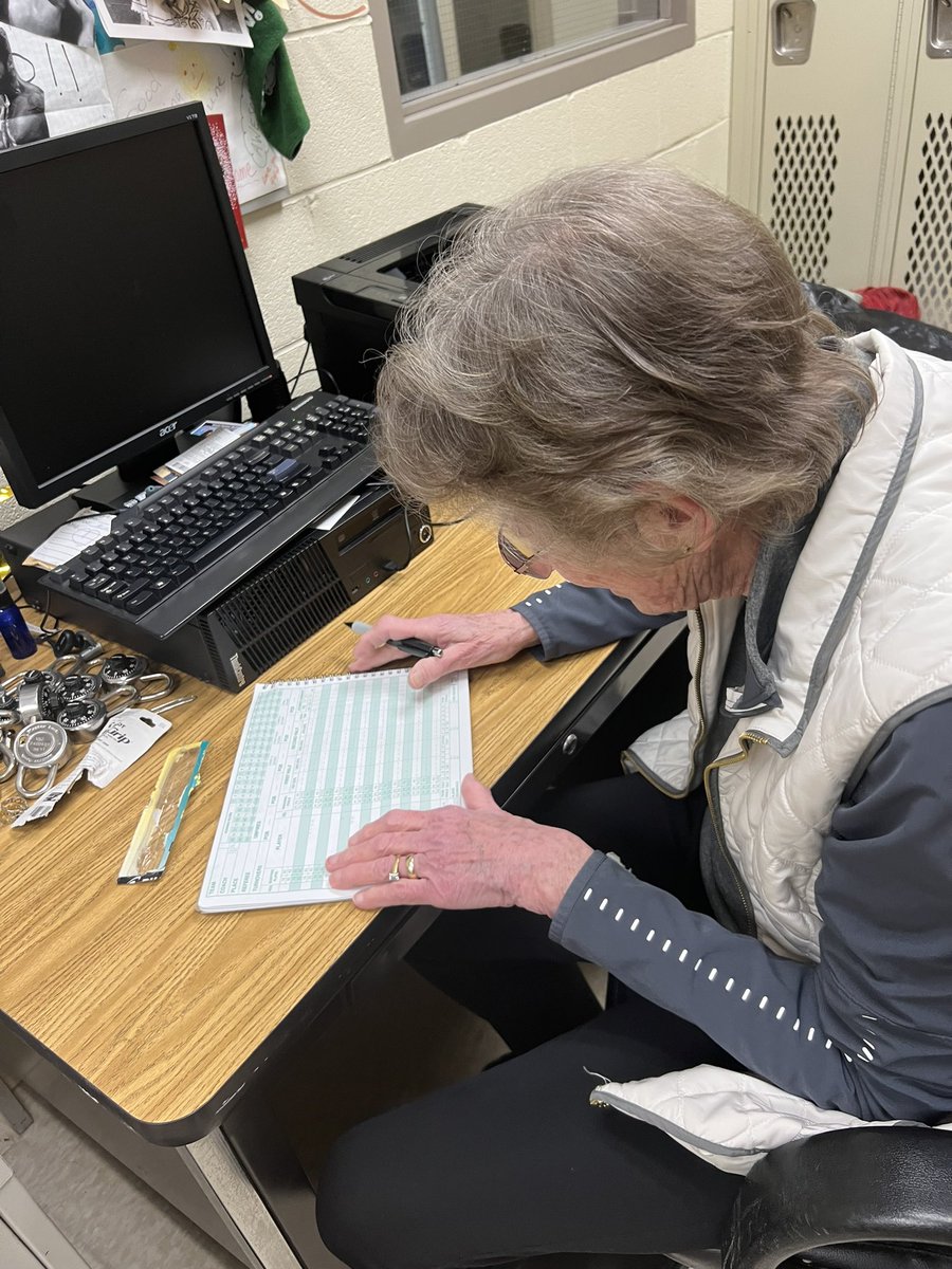 Gina Maher preparing to fill out her scorebook before tonight’s game as she goes for her 800th career victory. 

The Irvington coach has sat in the same seat, the same office, using the same pen for 20 years. Maher is incredibly superstitious - and as nervous as ever for tonight