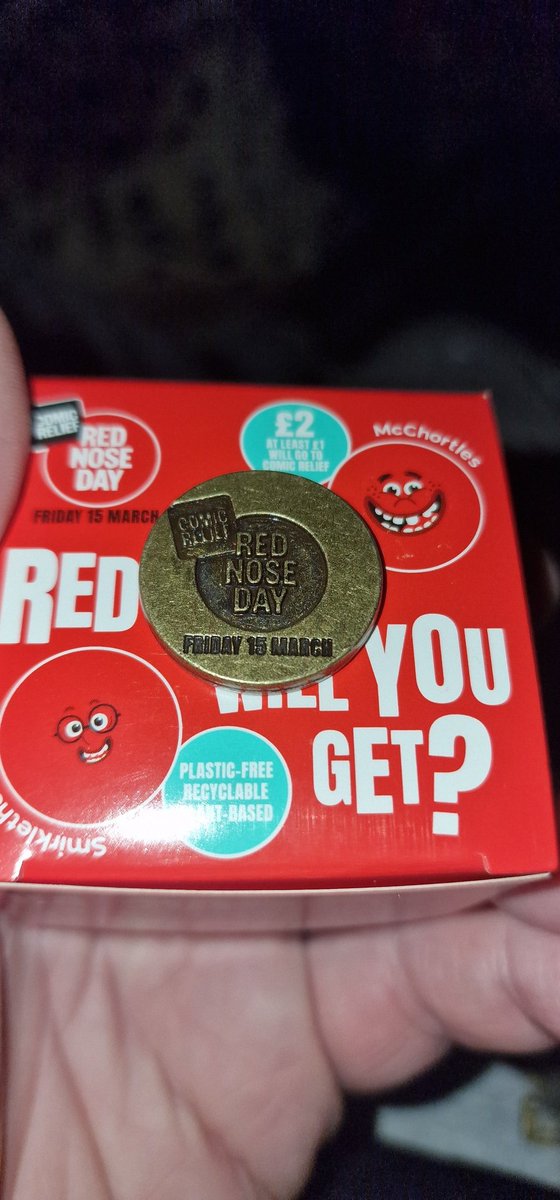 bennythomson's tweet photo. @comicrelief just opened my 2024 Red Nose Day single RED nose and found a coin. What's all this about? #rednoseday Trolley coin? https://t.co/OvsFZEhNYg