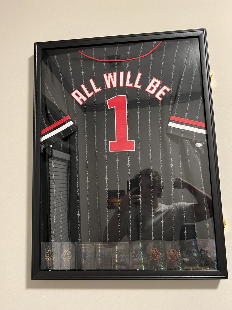 Carchump's tweet photo. Finally framed my Phyrexia jersey
#allwillbeone 

(Also I had no idea what to do in the reflection so please forgive the douchey flex ❤️) https://t.co/Q0KPGBH1jS