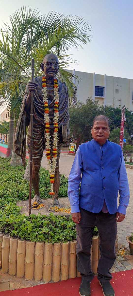 Under the statue of Father of the Nation -