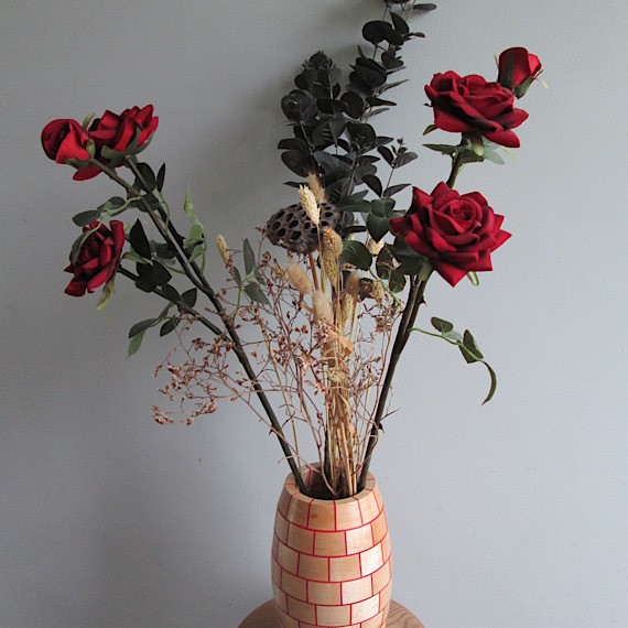 This beautiful Handmade Vase by Gary's Pens &amp; Turnings is made from 96 pieces of Maple hardwood, each segment has been cut and glued with red veneer in between to portray a brickwork effect.

Find this in their #ConsciousCrafties shop here consciouscrafties.com/handmade-gifts…

#SBSWinners