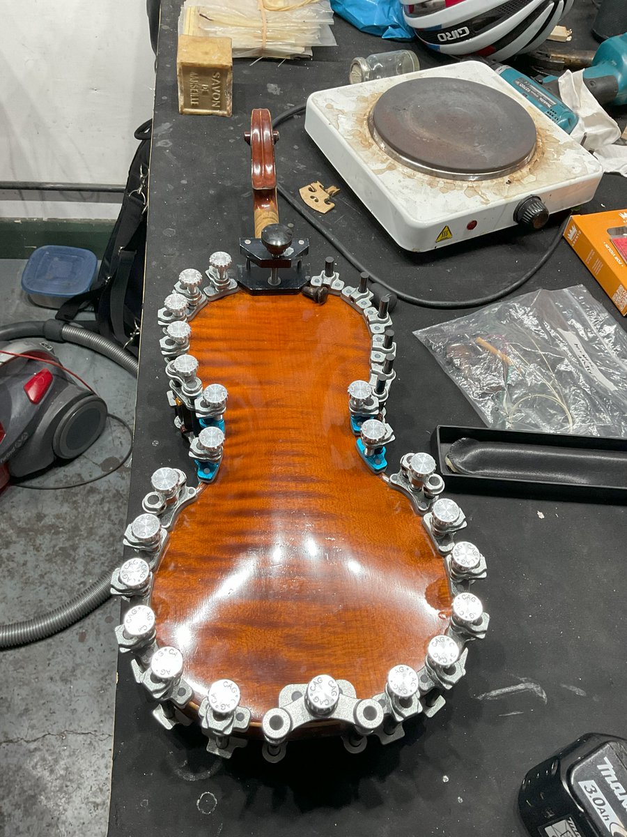Massimiliano has been working to reassemble this violin which a customer found in pieces. Before starting the jigsaw puzzle he relaxed the wood by sealing the pieces in a moisture rich bag. The reassembly is going well and almost looks like a violin again! #restoration #violin