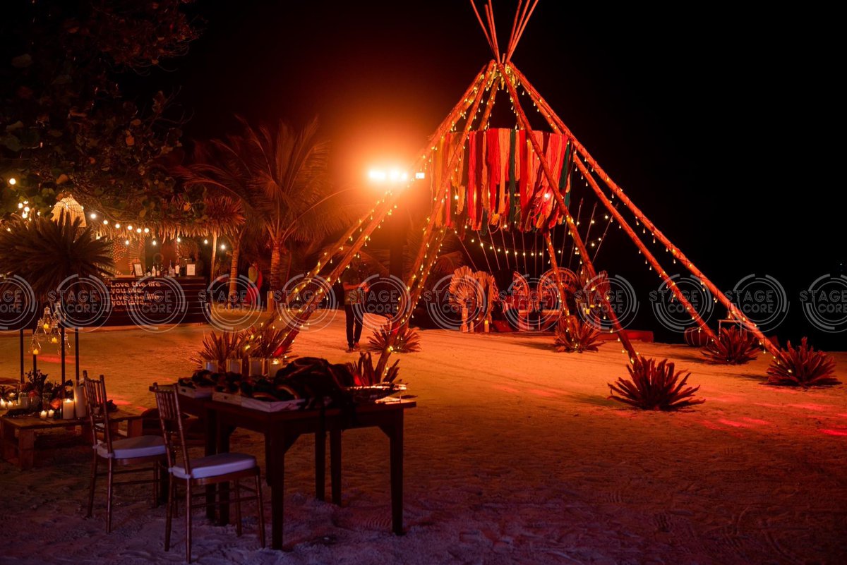 stagecoremv's tweet photo. Under the moon's tribal gaze, amidst the rugged allure of a Maldivian beach, a symphony of ragged rhythms resonates. It's a night where the spirit of Bob Marley's love permeates the air, weaving through the palm trees and dancing on the waves. Here, in this paradisiacal haven, souls unite in harmony, embracing the essence of freedom and connection under the starlit canopy of the tribal night.

#events #stagecoremv #maldives
