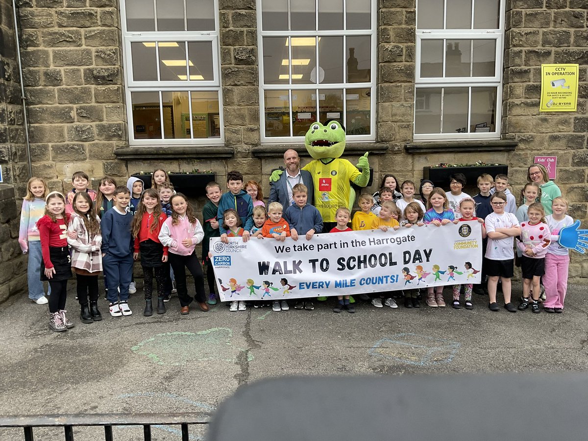 What a fantastic start to <a href="/NSPCC/">NSPCC</a> #NumberDay and #WalkToSchoolDay with a visit from Harry Gator from <a href="/HarrogateTown/">Harrogate Town AFC</a>. Thank you so much for giving the children plenty of smiles! The children were given reflective bands to help keep them safe when walking to and from school.
