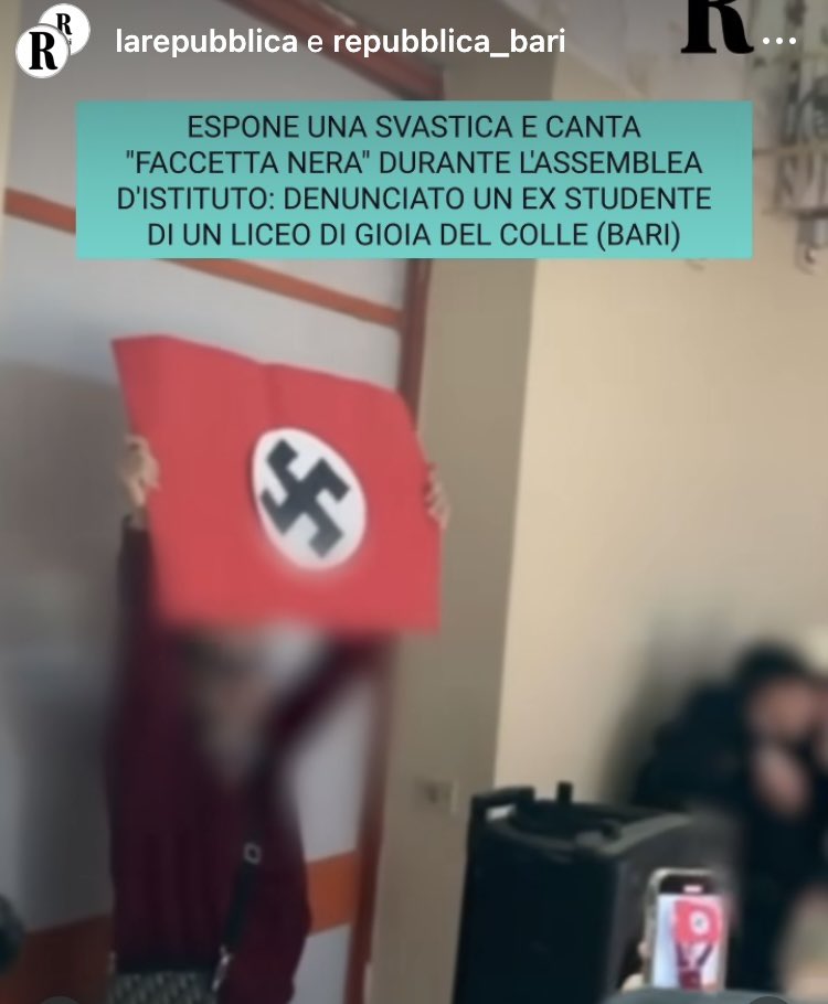 Cris_CHML's tweet photo. Hanno perso la testa. Un ex studente  mostra la svastica e canta “faccetta nera” durante l’assemblea in un liceo in provincia di Bari a Gioia Del Colle. https://t.co/7rMheCT0uN