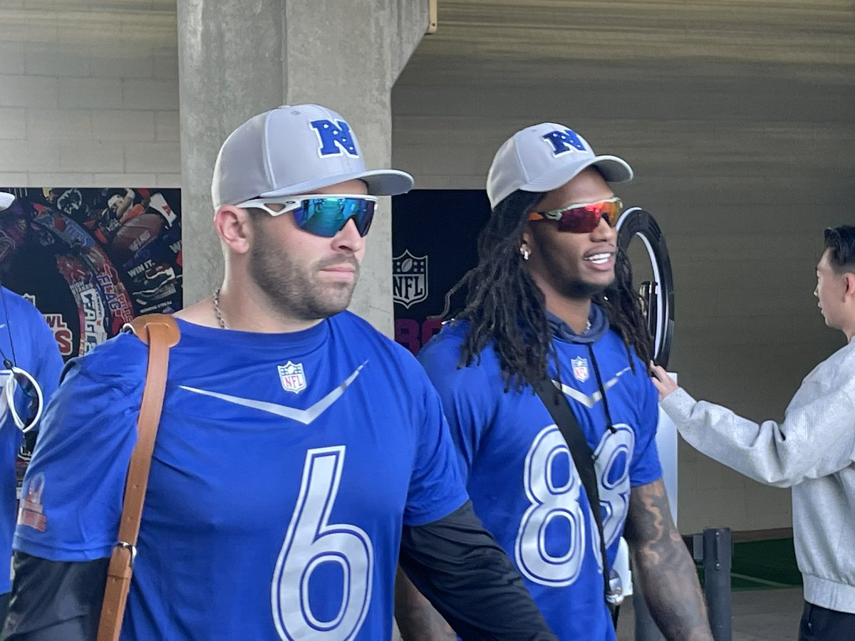 gregauman's tweet image. Bucs QB Baker Mayfield walks out to Pro Bowl practice in Orlando with Cowboys receiver CeeDee Lamb.