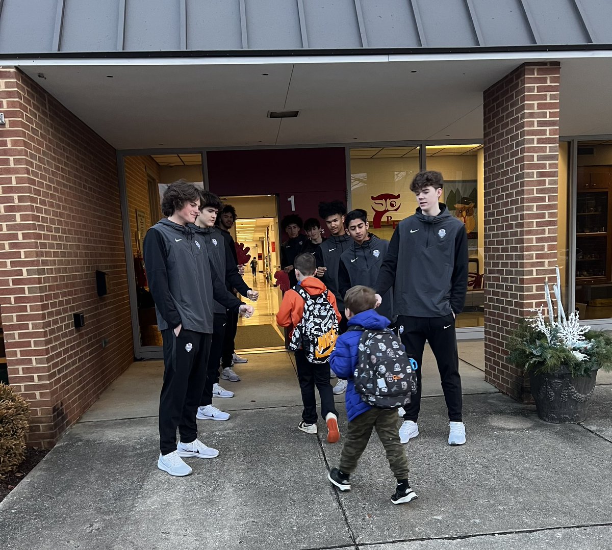 CoachGruse's tweet photo. High five Friday at PFES with our team! Had a great time! #cshoops https://t.co/vSNoxSNHkZ