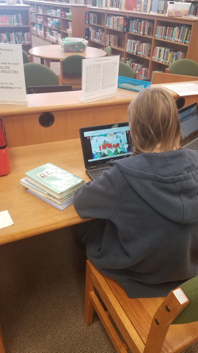 bookyourtime's tweet image. Coding in the library!