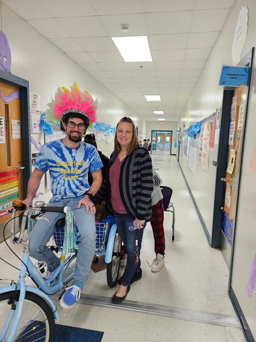 SugarloafRoar's tweet photo. Celebrating #SugarloafRoar WIGs! Here comes Mr. Mitchell on the Wig Wagon assisted by AP Phipps with rewards for students who successfully met their #LeaderInMe Wildly Important Goals! #seausroar https://t.co/BIuFGWjYzg