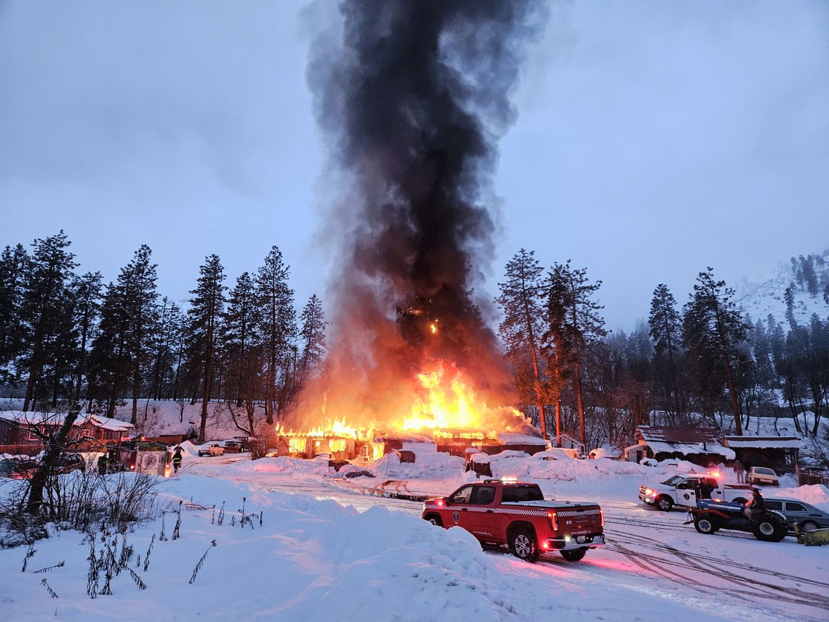 wsdot's tweet photo. It was a quiet Jan. 26 AM for maintenance worker Brandon Haight as he checked conditions on his usual US 97 Blewett Pass route. But then he noticed an unusual glow coming from behind a residential home near the highway. And he saw dark smoke. (1/6) https://t.co/YTnZ2fHNXk