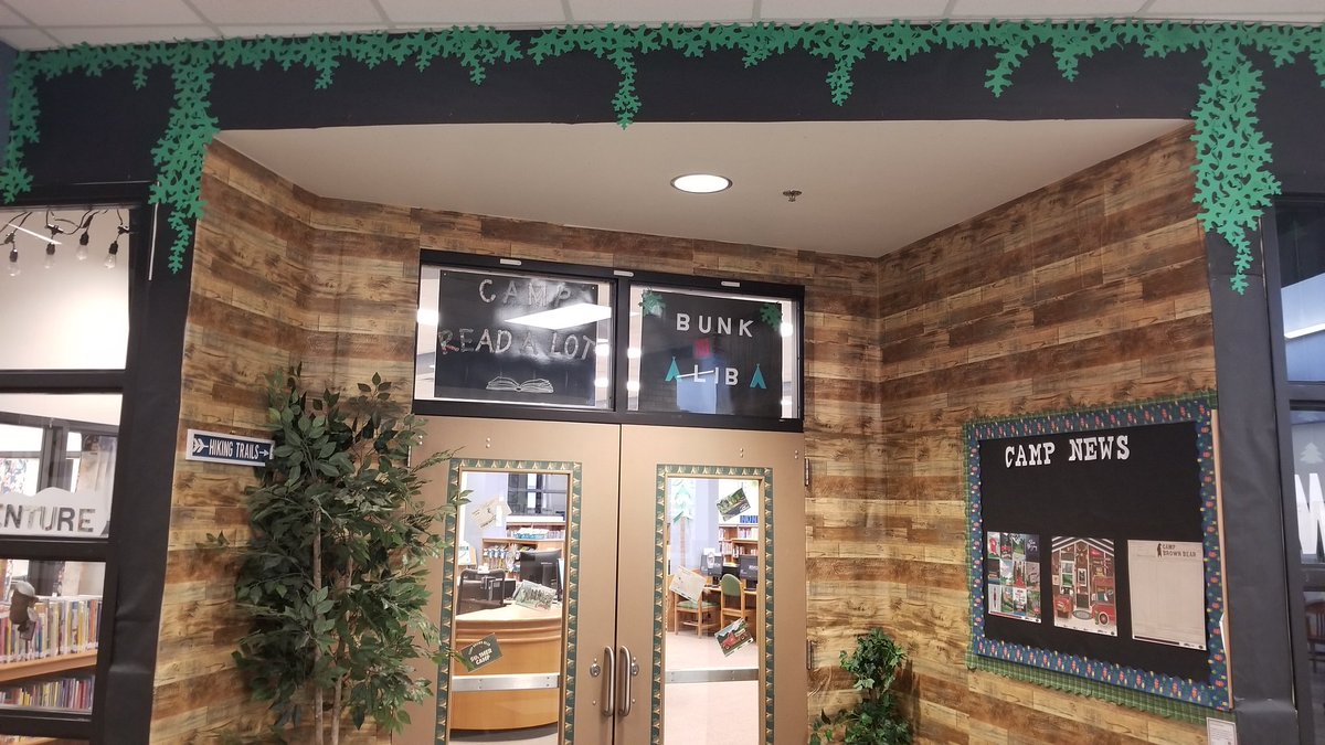 bookyourtime's tweet image. It's been a busy but fantastic school year! Finally posting the outside of the library. Our theme this year was Camp.@LANelsonLibrary
