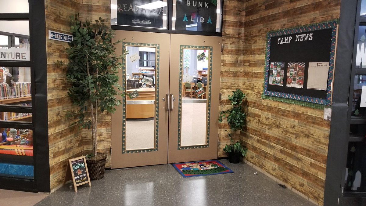 bookyourtime's tweet image. It's been a busy but fantastic school year! Finally posting the outside of the library. Our theme this year was Camp.@LANelsonLibrary