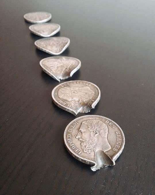 artifactmuseum's tweet photo. These coins were in the pocket of a #Belgian soldier named Optatius Buyssens, they stopped a bullet and saved his life during #WW1

More: https://t.co/dfYqdu55zB https://t.co/WLNY3iYOt5