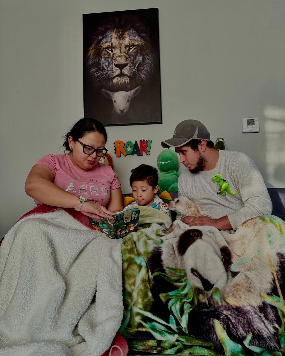 AvenueKae's tweet photo. Kindergartener Gerson enjoys a good book with his grown-ups! #WhitehallReads @WhitehallRAMS https://t.co/7sgY5RtA2j