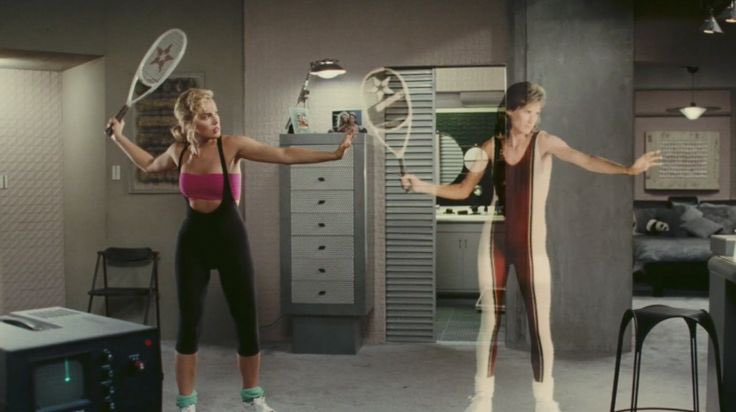 So many MR posts out there that focus on enhancing practical, everyday experiences (vacuuming?)! Thought it’d be fun to highlight popular culture predicting current times! This might take a few posts. Here’s Sharon Stone learning to play tennis in Total Recall (1990)…
