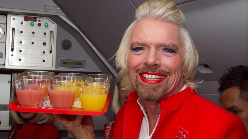 runews's tweet image. Remember when Richard Branson playfully worked as a flight attendant in drag? 

Now, Swiss Airlines is turning the tables, allowing men to wear makeup, fake eyelashes, lipstick, and skip leg shaving. 

What started as a joke is now a reality. #InclusiveSkies ✈️💄