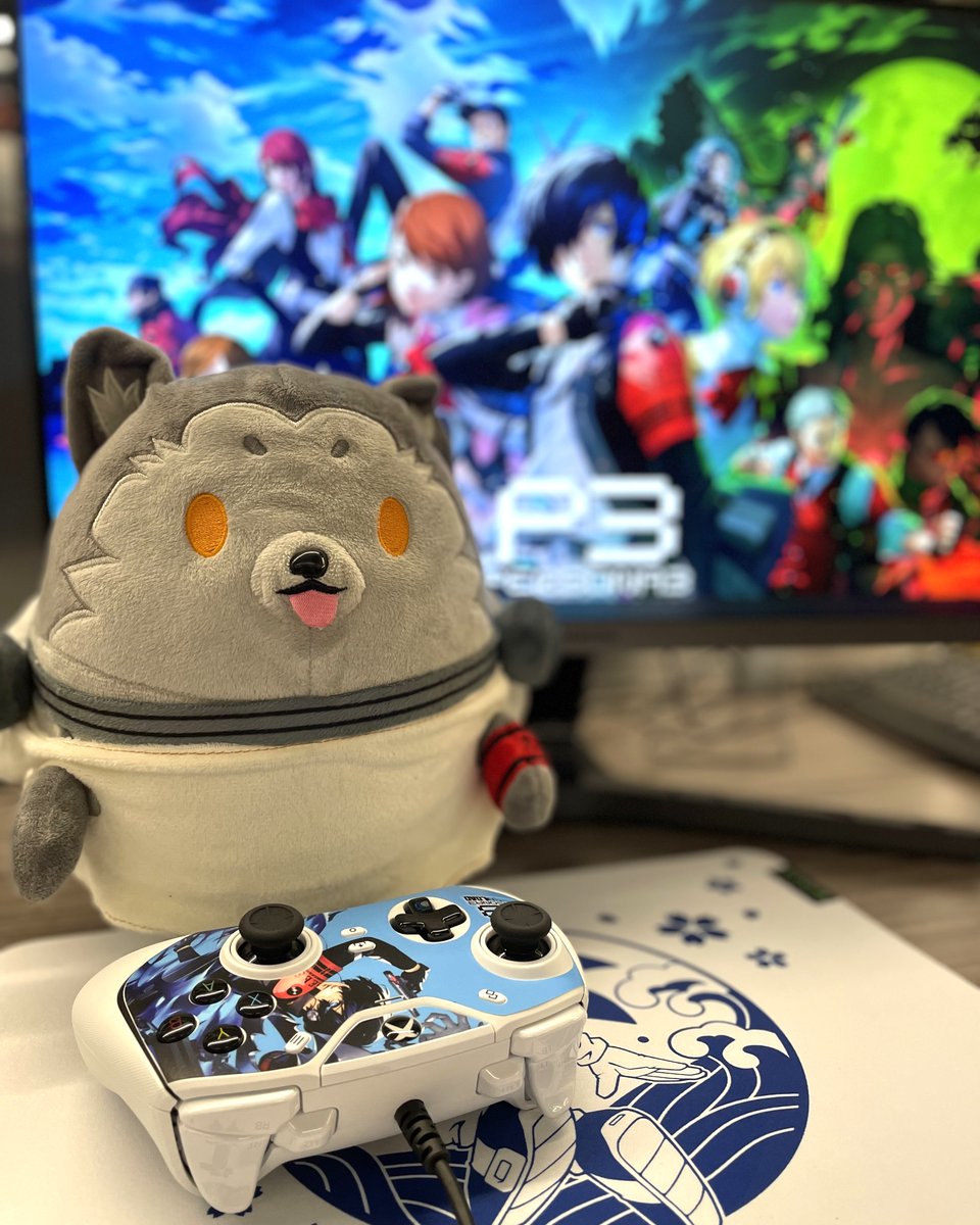 Koromaru's playing Persona 3 Reload, why aren't you? 🎮