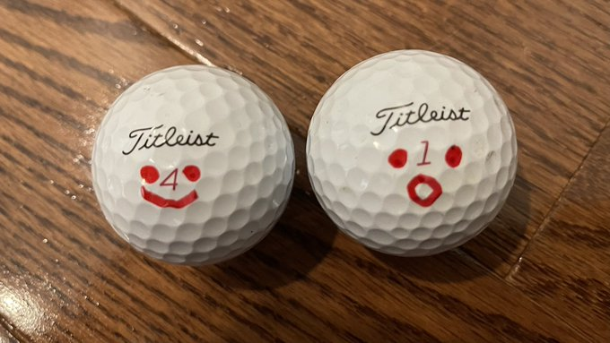 This is how I mark my golf ball. Smiley face on the left is the standard marking. Surprise face on the right is for provisionals or reloads.

I can’t show the marking if I need a third ball. 😀

Do you have a standard way you mark your ball?