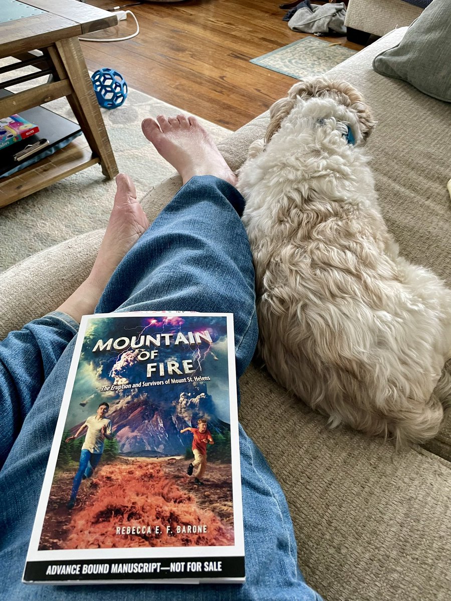 The best way to spend a Saturday?  Coffee, dogs and a great book!  Thx to @rebeccaefbarone for sharing #MountainofFire - The Eruption and Survivors of Mt. St. Helens with #bookposse! @HenryHolt @MacKidsBooks