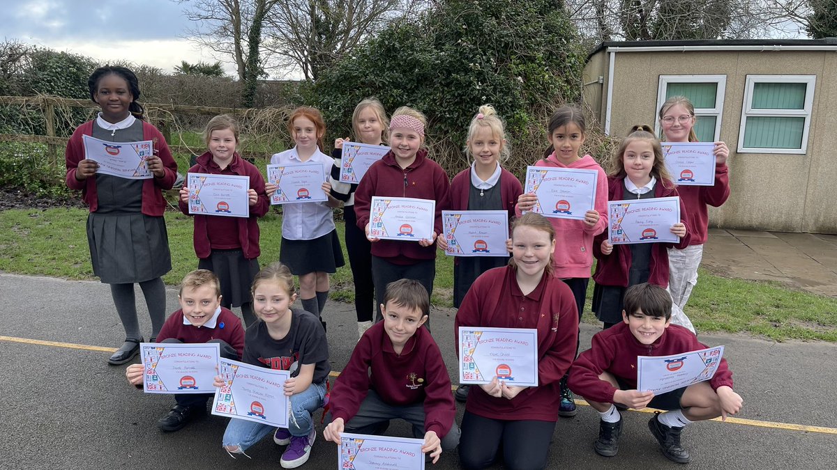 These children have achieved their Bronze Reading Award for reading more than 50 books this year! Well done ☺️