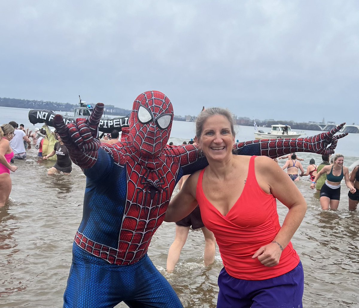 LCharkoudian's tweet photo. Climate activists from across the region jumping in the Potomac for the @CCAN #KeepWinterCold #PolarBearPunge (note - the day might be mild, but I promise the water was freezing!) https://t.co/3mQedfTY5R