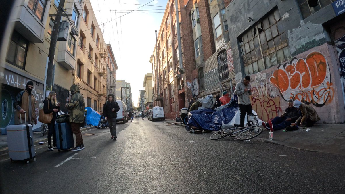 The drug tourists on Willow St drift into SF looking like the folks on the left in the pic below, and inevitably wind up like the folks on the right. 2/1/24.