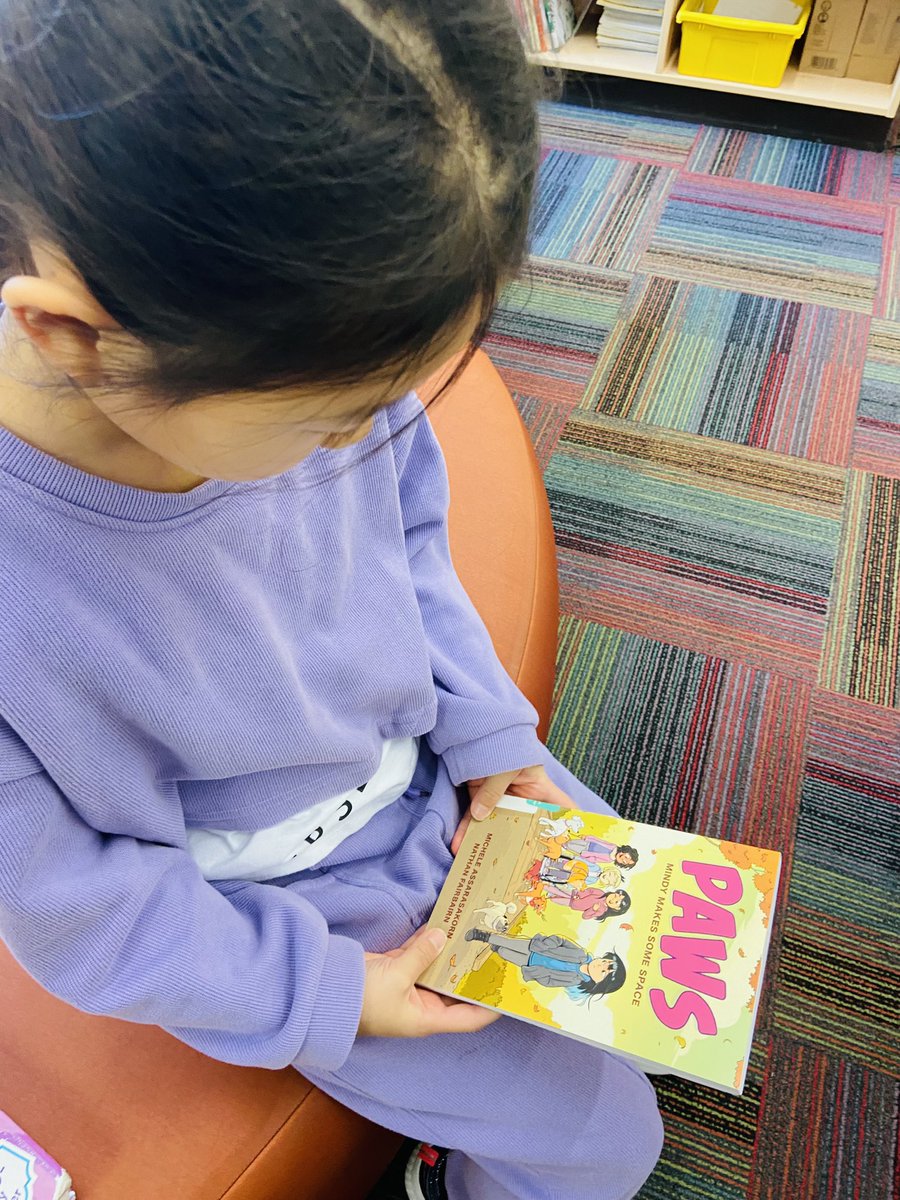 Angle_Bellmoore's tweet photo. This moment from Friday reminds us: 
✔️why school libraries matter
✔️why we must listen and respond to our students
✔️why we must curate our collections with intention and fund and allocate elementary school libraries 
✔️why we must create safe spaces where students belong and matter 

We found this student very carefully looking for a book to read. Every other student in her class had already found their books, but she was really taking her time. We asked if we could help her and then we came across this new graphic novel by @nathanfairbairn - we had just added it to our display of new books that morning. I asked if she wanted to try it - we knew she liked to read other graphic novels and this series looked appealing - it’s like Baby-Sitters Club for pets and she said yes. 

And then she looked up at me and asked, “Is she Korean like me? She looks like me. Or maybe she’s from China. Do you know?” I told her that I didn’t know and then she said she would read it, and tell me when she found out. 

As we were checking out, she asked me about our recent Podmoore: Voices at Bellmoore podcast, Episode 6 - Let’s Learn More About Lunar New Year. She said she wanted to be in this podcast, too. I explained that we had already recorded it with some other Bellmoore students who celebrate Lunar New Year and we could listen to it together with her class next week. I shared that we would also decorate our front display case for Lunar New Year on Monday and I asked her if she wanted to help. She looked up at me with the biggest smile and said, “yes please. I would love that.” 

We hope she read this book before bed last night. We hope she found it to be so good that she couldn’t put it down. And we cannot wait to see her on Monday to find out if she liked it. And we cannot wait to find her to create our front display to celebrate Lunar New Year with our students - to share THEIR voices and hear from them, our student leaders and experts. 

THESE moments here matter so much. When we talk about creating positive learning environments focused on well-being where EVERY student feels safe, and knows they belong - this is it right here. These quiet moments with this student who found a book to read in our school library learning commons and is excited to be part of an opportunity to celebrate her family’s traditions. 

We both walked out of our LC with the BIGGEST smiles on our faces. ♥️♥️♥️

Shared with permission - in fact she asked if I would share this because “we need more books that look like me.” Yes, we do. 👏🏼👏🏼👏🏼

#SchoolLibraryJoy 
#ONschoollibraries 
@oslacouncil
@CdnSchoolLibrar