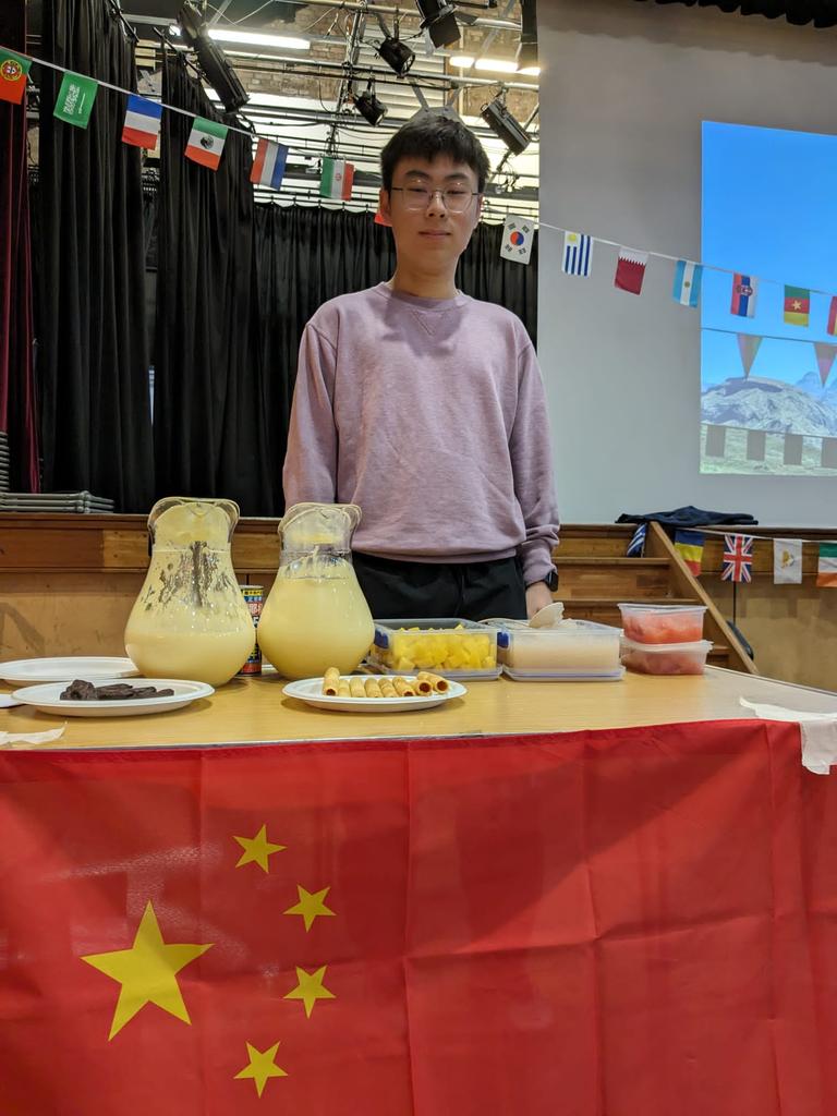 International Culture Fair a brilliant success. New House's Max serving delicious treats on the 🇨🇳 stand.