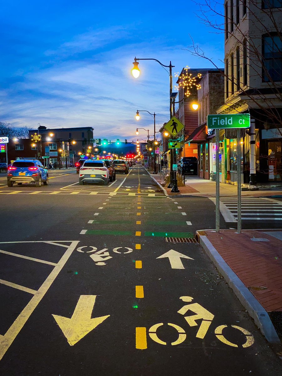 Gregg8081's tweet photo. What they did in Kingston NY is beautiful, Washington Street in #Peekskill is certainly wide enough for a set up like this @peekskill_walks. It’ll ease traffic speeds and a bike lane means less cars on the road https://t.co/X1PosSQGTF