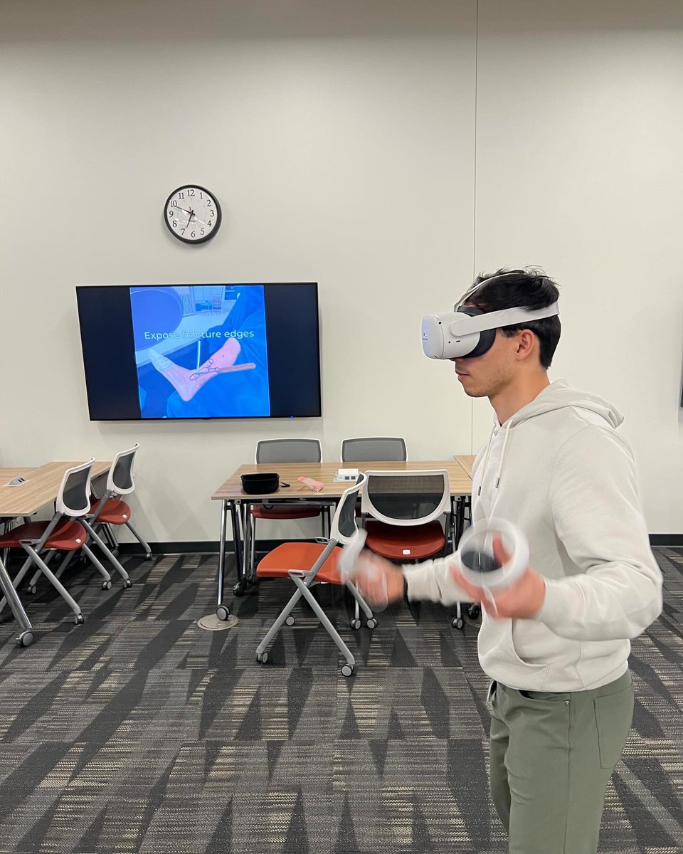 dunson_blake's tweet photo. Thrilled to showcase some highlights from the latest Surgery In The Metaverse (SIM) event! Participants engaged with five VR headsets, experiencing state-of-the-art surgical simulations. #surgeryinthemetaverse #VirtualReality #medicaleducation https://t.co/hLrnGLuXh4