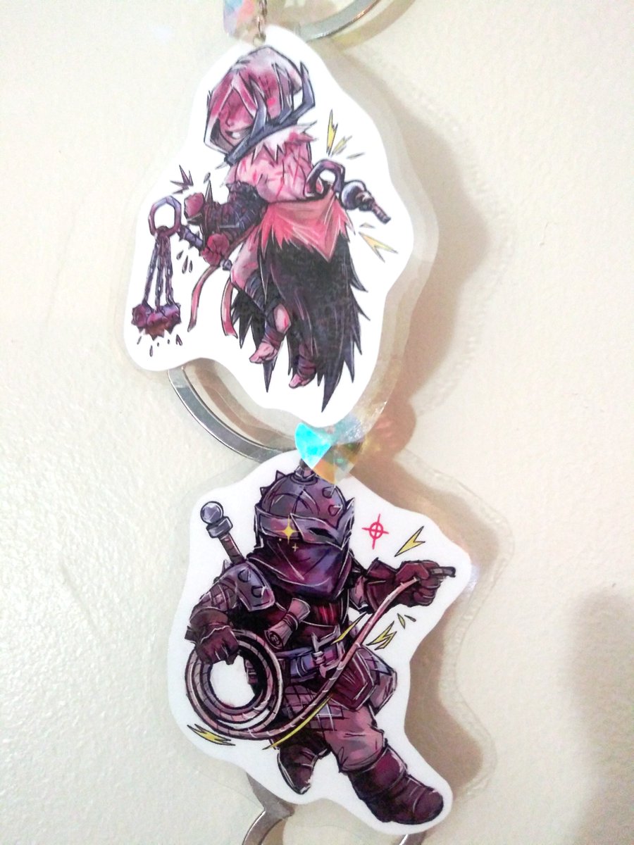 jozziedrewit's tweet photo. Whose ready for some #ddzine23 merch? 
My handmade #bountyhunter x #flagellant
keychains! 🪓❤️‍🩹🩸
They're light-weight, double-sided and laminated!
(+ cute of course!) #darkestdungeon https://t.co/MwvFuyJ3Nx