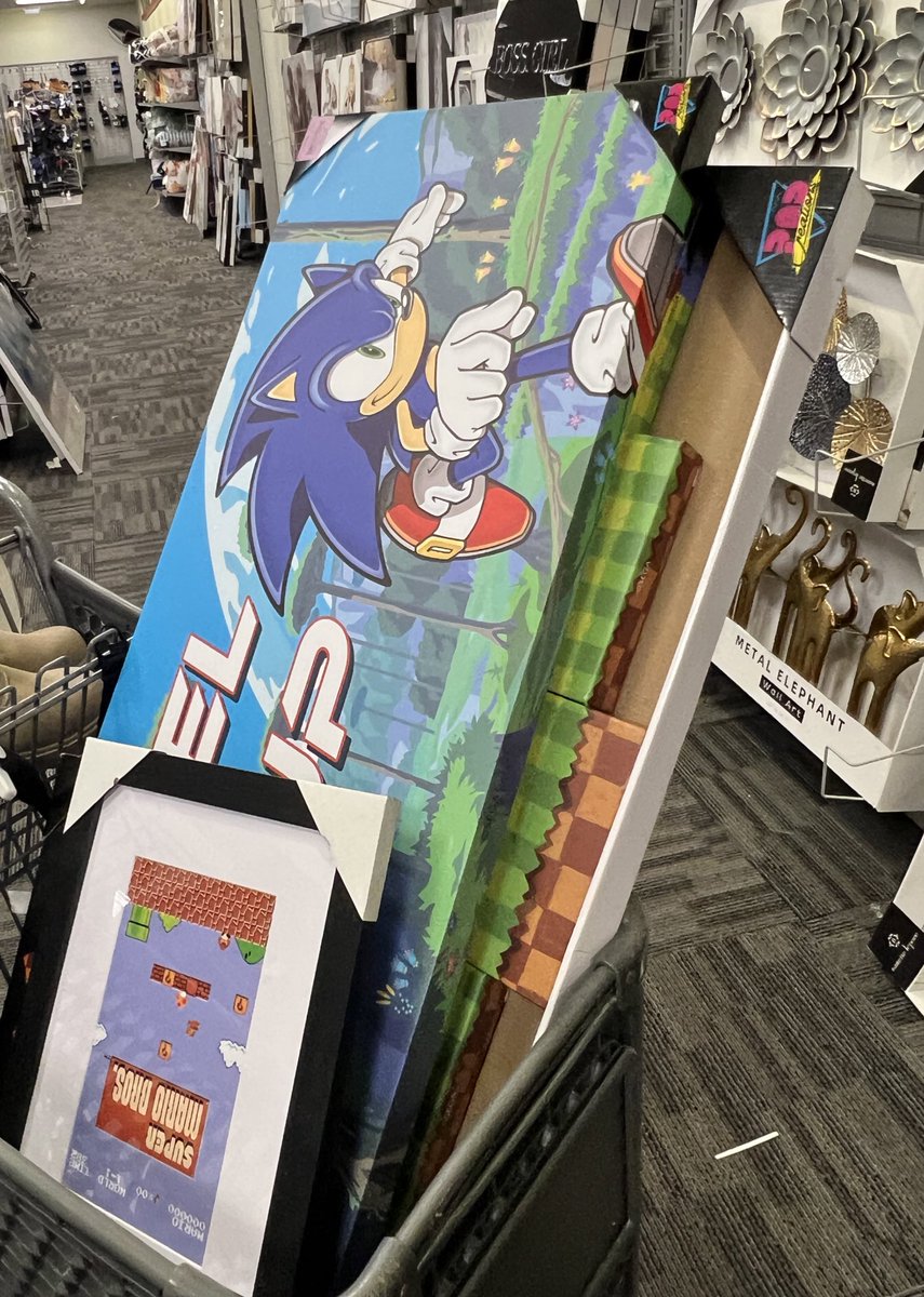 My hair hasn’t even been shadow the hedgehog colors for 2 days and already 1. Had a sonic backpack I’ve been wanting come back in stock 2. Was advertised a nail artist that does chao nail art 3. Found clearance sonic wall art for >$10 at a local store.  WHAT https://t.co/jmPcmMKxtJ