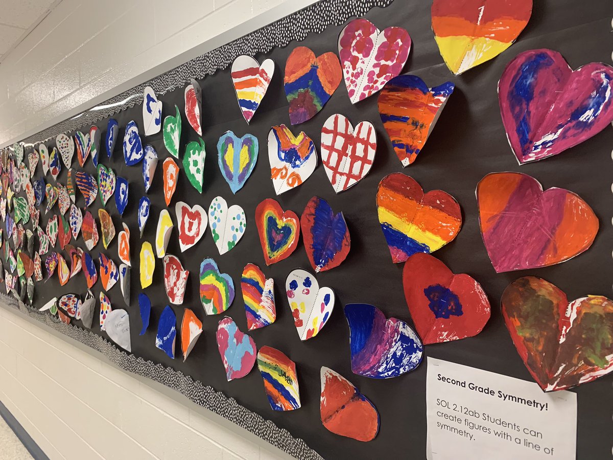 💙💗💜🐾 Second graders learned about lines of symmetry in time to decorate their hallway with symmetry hearts before Valentine’s Day! We love the colorful artwork!