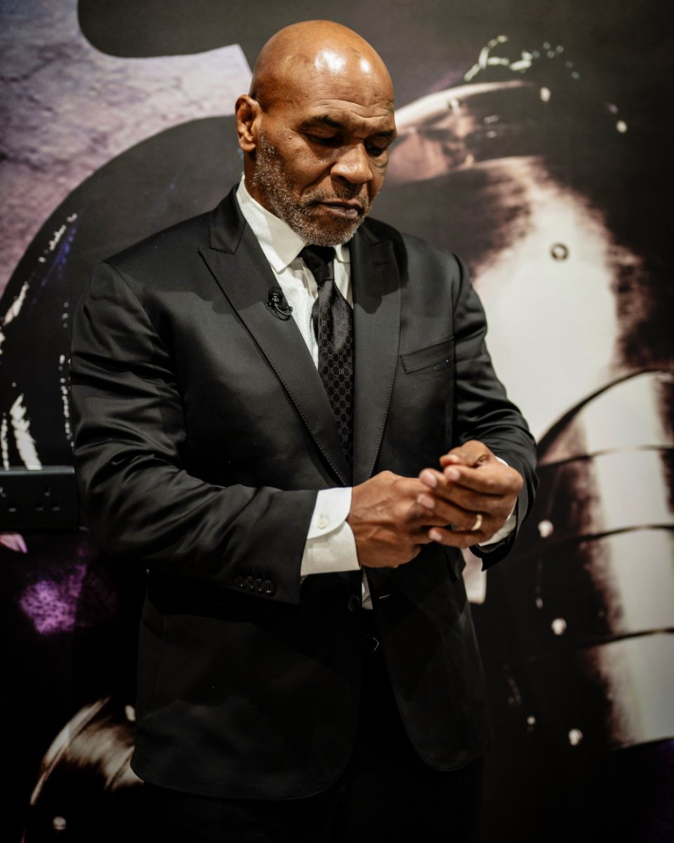 MikeTyson's tweet photo. "Get suited so you don't get booted" https://t.co/sOwzvRTnkY