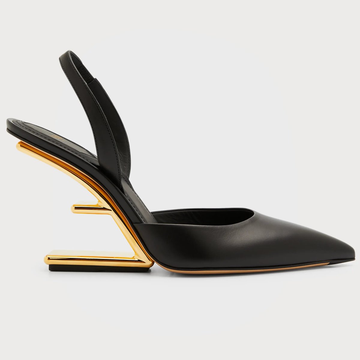 yournextshoes's tweet photo. Turn heads just like Reese Witherspoon in the Fendi First slingbacks! 🖤✨ Chic black leather meets a stunning gold sculpted heel for that bold Fendi statement. As seen at the Paris Couture Show, they're not just shoes, they're wearable art: https://t.co/3HJPgW8xjw #FendiFirst #CoutureFashion #StyleIcon